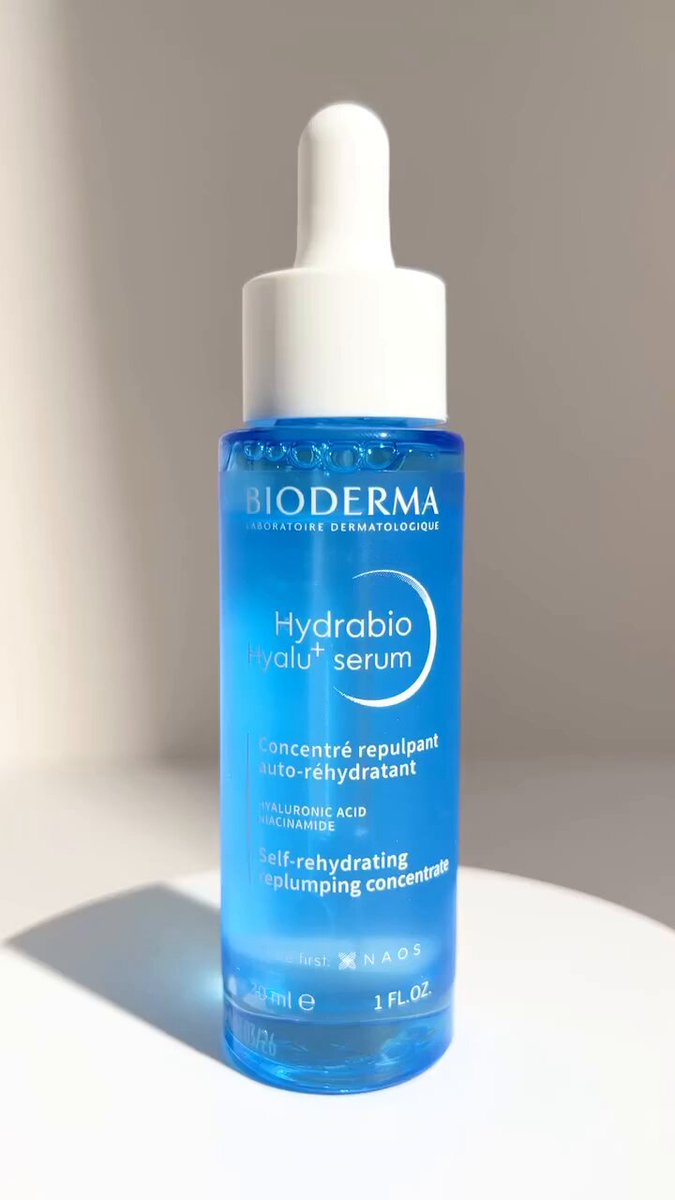Blue serum bottle macro commercial