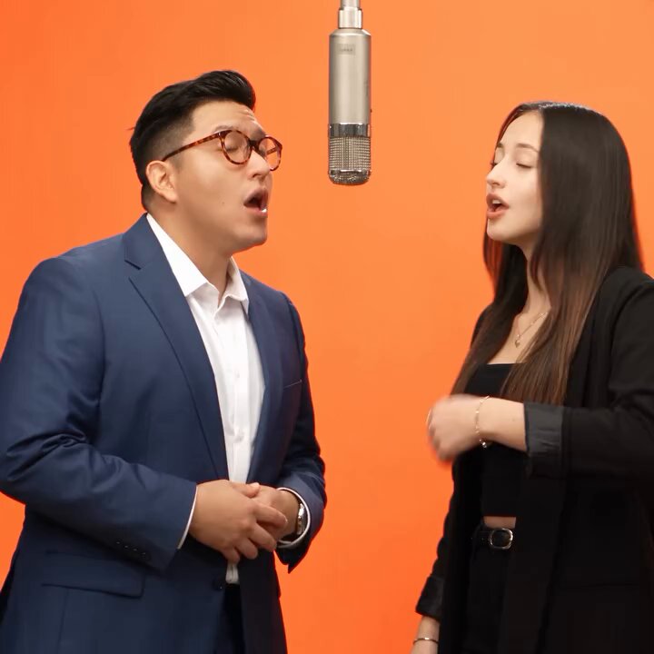 Studio Performance Against Orange Backdrop