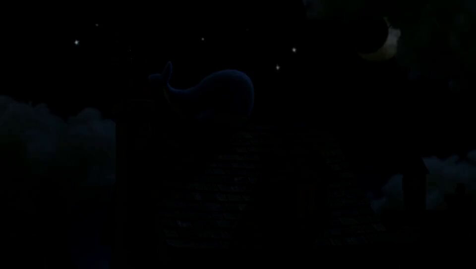 Felt Whale Floating on Night Rooftop