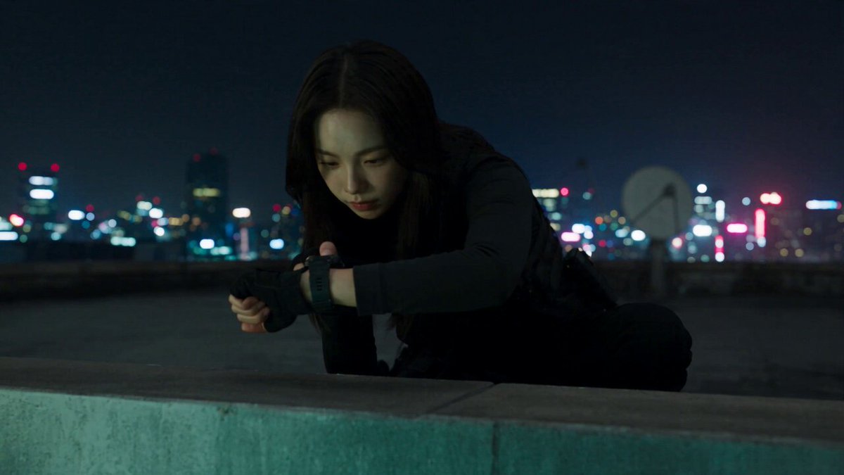 Neon rooftop heist team cracks vault