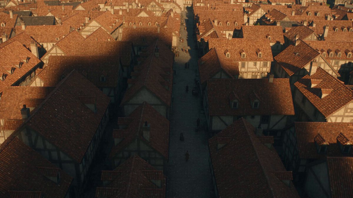 Colossal titan kicks medieval city gate