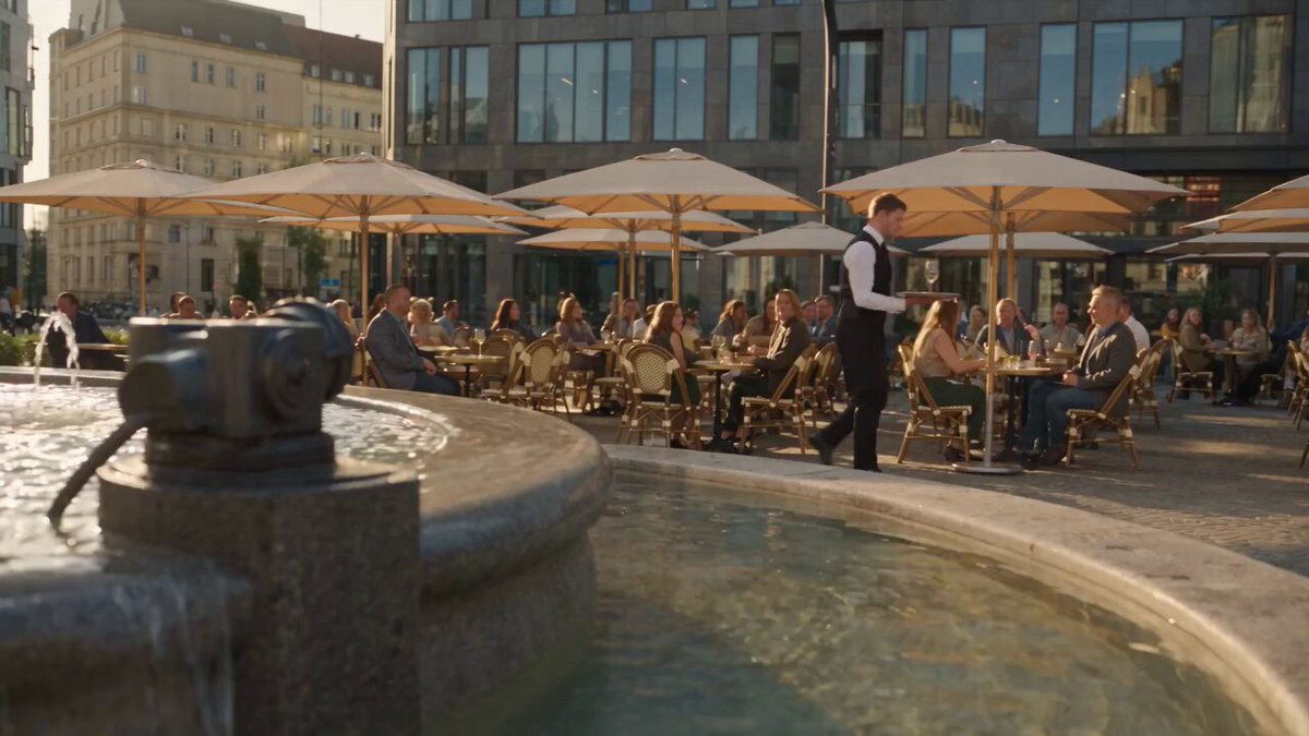 Man freezes time in plaza