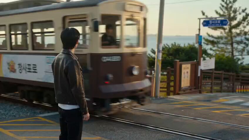 Coastal Korean romantic encounter at golden hour
