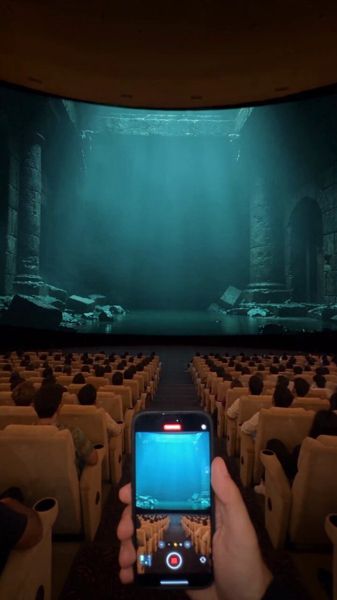 Creature breaks out of cinema screen