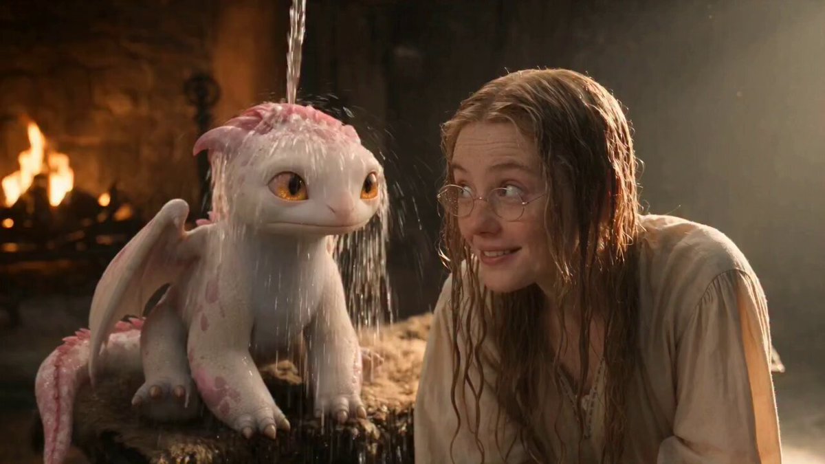 A magical baby dragon gives a young woman the most unexpected hairstyle